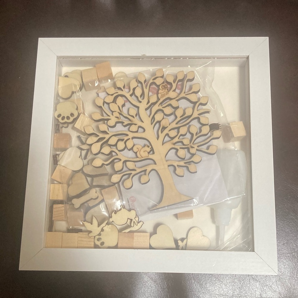 Shadow box with wooden accents